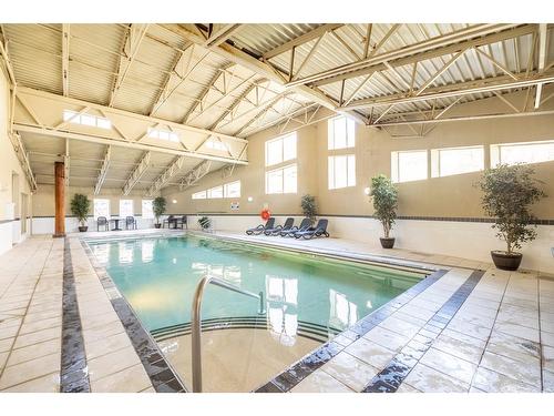 307 - 1500 Mcdonald Avenue, Fernie, BC - Indoor Photo Showing Other Room With In Ground Pool