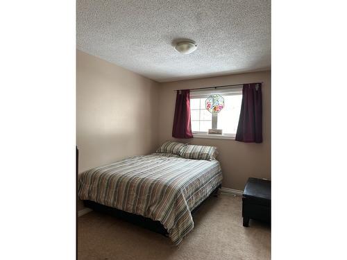 302 Alpine Place, Sparwood, BC - Indoor Photo Showing Bedroom