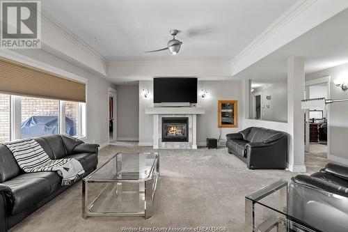404 County Road 2, Lakeshore, ON - Indoor Photo Showing Living Room With Fireplace