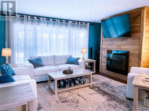 1701 Haileybury Crescent, Timmins (East), ON - Indoor Photo Showing Living Room With Fireplace