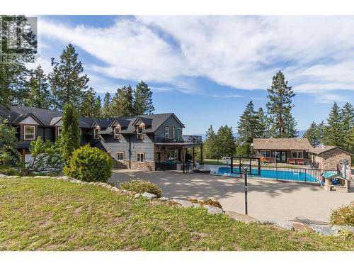 4444 June Springs Road, Kelowna, BC - Outdoor With In Ground Pool With Facade