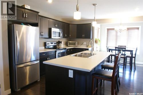 338 Eaton Lane, Saskatoon, SK - Indoor Photo Showing Kitchen With Double Sink With Upgraded Kitchen