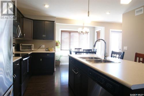 338 Eaton Lane, Saskatoon, SK - Indoor Photo Showing Kitchen With Double Sink