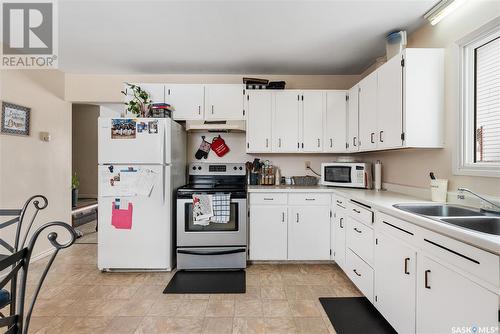2409 - 2411 Richardson Road, Saskatoon, SK - Indoor Photo Showing Kitchen With Double Sink