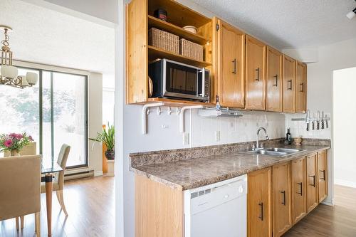 75 Queen Street N|Unit #308, Hamilton, ON - Indoor Photo Showing Kitchen With Double Sink