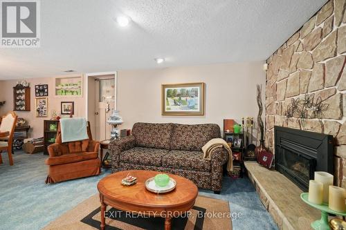 16686 Highway 2, Quinte West, ON - Indoor Photo Showing Living Room With Fireplace