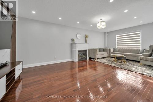54 Earlsbridge Blvd, Brampton, ON - Indoor Photo Showing Living Room With Fireplace