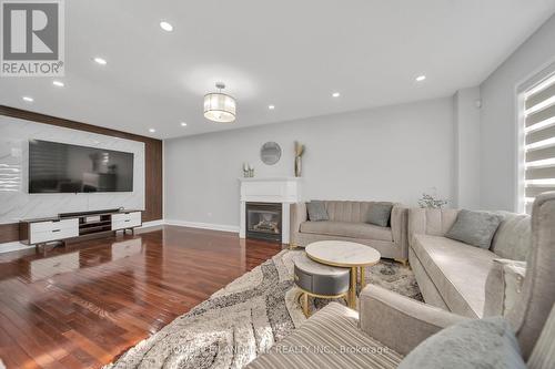 54 Earlsbridge Blvd, Brampton, ON - Indoor Photo Showing Living Room With Fireplace