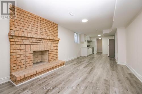 20 Kesteven Crescent, Brampton, ON - Indoor Photo Showing Other Room With Fireplace