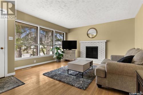 609 Broadway Avenue E, Regina, SK - Indoor Photo Showing Living Room With Fireplace