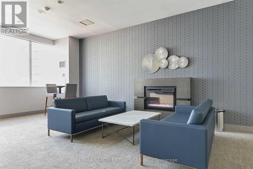 #436 -250 Wellington St W, Toronto, ON - Indoor Photo Showing Living Room With Fireplace