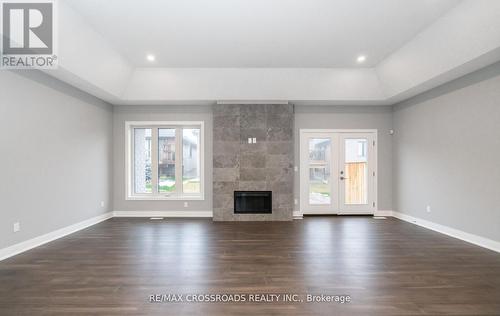 614 Old Course Trail, Welland, ON - Indoor Photo Showing Living Room With Fireplace