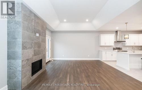 614 Old Course Trail, Welland, ON - Indoor Photo Showing Kitchen With Fireplace