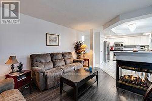 3173 Innisdale Rd, Mississauga, ON - Indoor Photo Showing Living Room With Fireplace