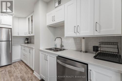 #604 -389 Dundas St, London, ON - Indoor Photo Showing Kitchen With Double Sink