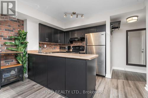 #308 -21 Earl St, Toronto, ON - Indoor Photo Showing Kitchen With Double Sink