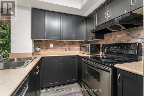 #308 -21 Earl St, Toronto, ON - Indoor Photo Showing Kitchen With Double Sink