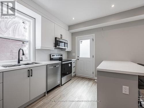 #Upper -343 Arthur St, Oshawa, ON - Indoor Photo Showing Kitchen With Stainless Steel Kitchen With Double Sink