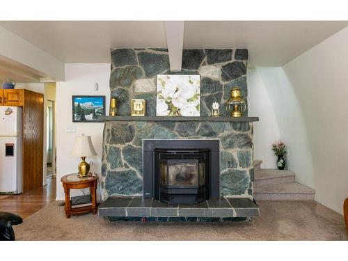 5800 97B Highway, Salmon Arm, BC - Indoor Photo Showing Living Room With Fireplace