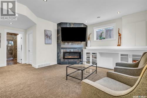 850 4Th Street S, Martensville, SK - Indoor Photo Showing Living Room With Fireplace