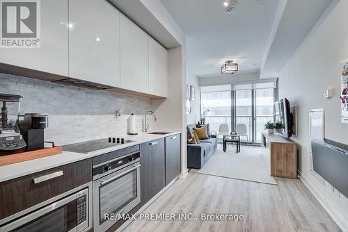 #607 -50 Charles St E, Toronto, ON - Indoor Photo Showing Kitchen With Upgraded Kitchen