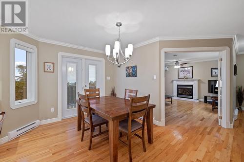 36 Vineyard Drive, Paradise, NL - Indoor Photo Showing Dining Room With Fireplace
