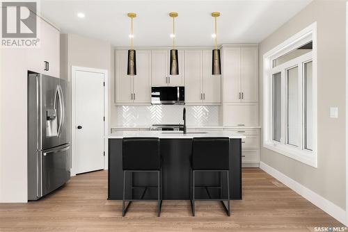 202 Fairway Road, Emerald Park, SK - Indoor Photo Showing Kitchen With Upgraded Kitchen