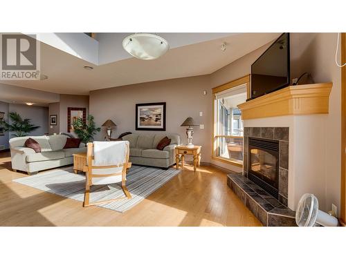 3473 Lakeview Place Unit# 203, Enderby, BC - Indoor Photo Showing Living Room With Fireplace