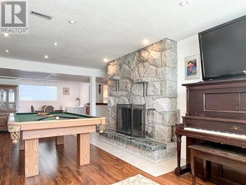 9106 Hummingbird Lane, Osoyoos, BC - Indoor Photo Showing Other Room With Fireplace
