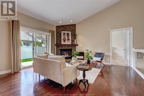 423 Sand Point Court, Windsor, ON - Indoor Photo Showing Living Room With Fireplace