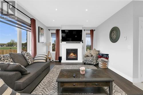 201 Morton, Essex, ON - Indoor Photo Showing Living Room With Fireplace