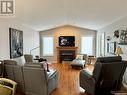 2239 Gardiner Place, Regina, SK  - Indoor Photo Showing Living Room With Fireplace 