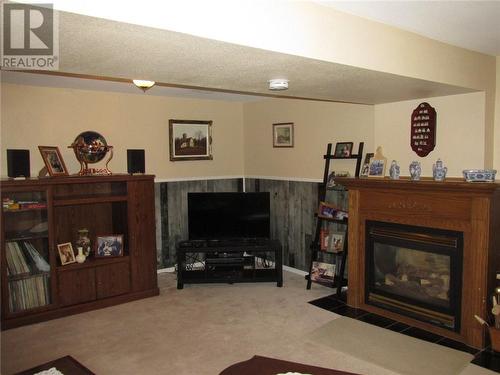 19 Esten Drive S, Elliot Lake, ON - Indoor Photo Showing Living Room With Fireplace