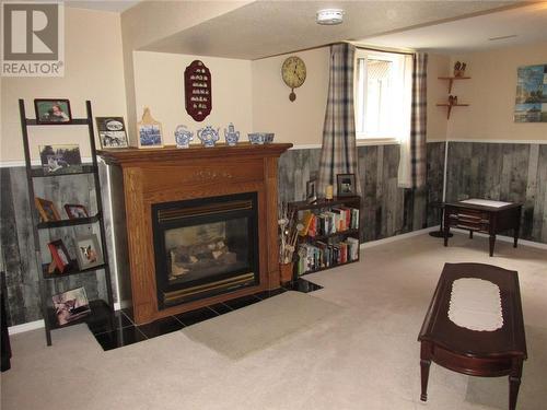 19 Esten Drive S, Elliot Lake, ON - Indoor Photo Showing Other Room With Fireplace