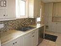 19 Esten Drive S, Elliot Lake, ON  - Indoor Photo Showing Kitchen With Double Sink 