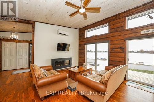 1083 Riverside Drive, Parry Sound Remote Area, ON - Indoor Photo Showing Living Room With Fireplace