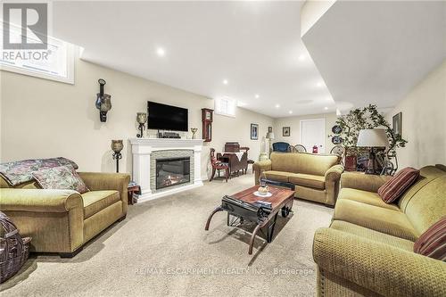 139 St. Michaels Street, Norfolk, ON - Indoor Photo Showing Living Room With Fireplace