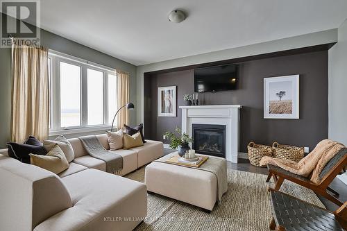 4 Middleton Dr, Wasaga Beach, ON - Indoor Photo Showing Living Room With Fireplace