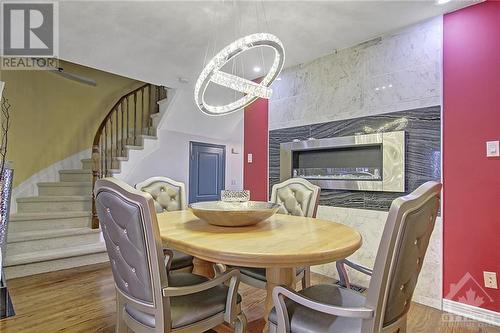 4 Cambray Lane, Ottawa, ON - Indoor Photo Showing Dining Room With Fireplace