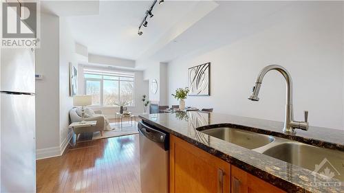 950 Marguerite Avenue Unit#306, Ottawa, ON - Indoor Photo Showing Kitchen With Double Sink