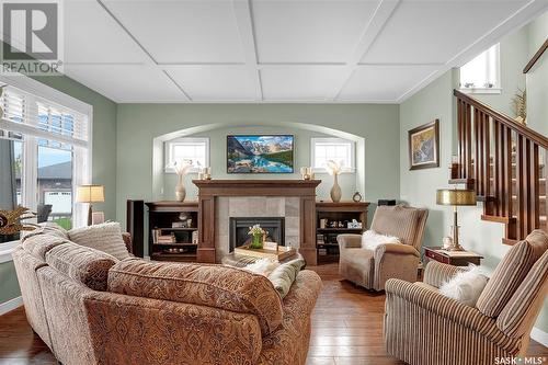 4824 Mccombie Crescent, Regina, SK - Indoor Photo Showing Living Room With Fireplace
