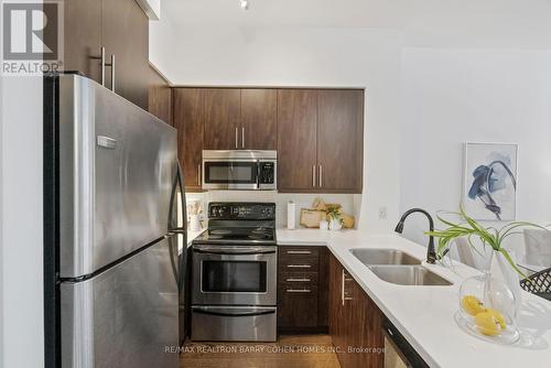 #203 -500 St Clair Ave W, Toronto, ON - Indoor Photo Showing Kitchen With Stainless Steel Kitchen With Double Sink