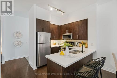 #203 -500 St Clair Ave W, Toronto, ON - Indoor Photo Showing Kitchen With Stainless Steel Kitchen With Double Sink