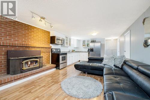 244 Laurier Ave, Milton, ON - Indoor Photo Showing Living Room With Fireplace