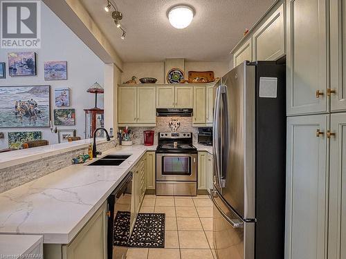 735 Garden Court Crescent, Woodstock, ON - Indoor Photo Showing Kitchen With Double Sink