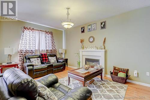 3 Jorma Palomaki Terr, Toronto, ON - Indoor Photo Showing Living Room With Fireplace