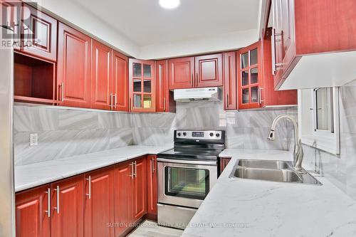 102 Paradelle Cres, Toronto, ON - Indoor Photo Showing Kitchen With Double Sink
