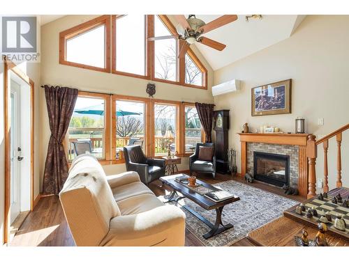 7331 Fintry Delta Road, Kelowna, BC - Indoor Photo Showing Living Room With Fireplace