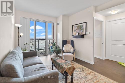 #1303 -50 Thomas Riley Rd, Toronto, ON - Indoor Photo Showing Living Room