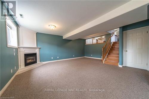 8213 Harvest Cres, Niagara Falls, ON - Indoor Photo Showing Other Room With Fireplace